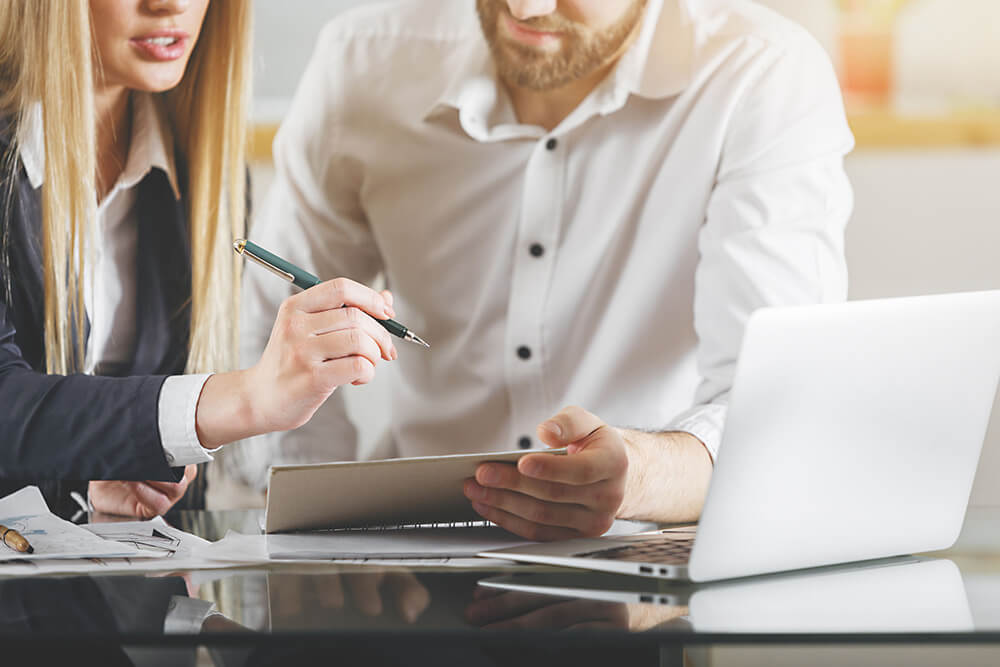 man and woman working with Livecare Support